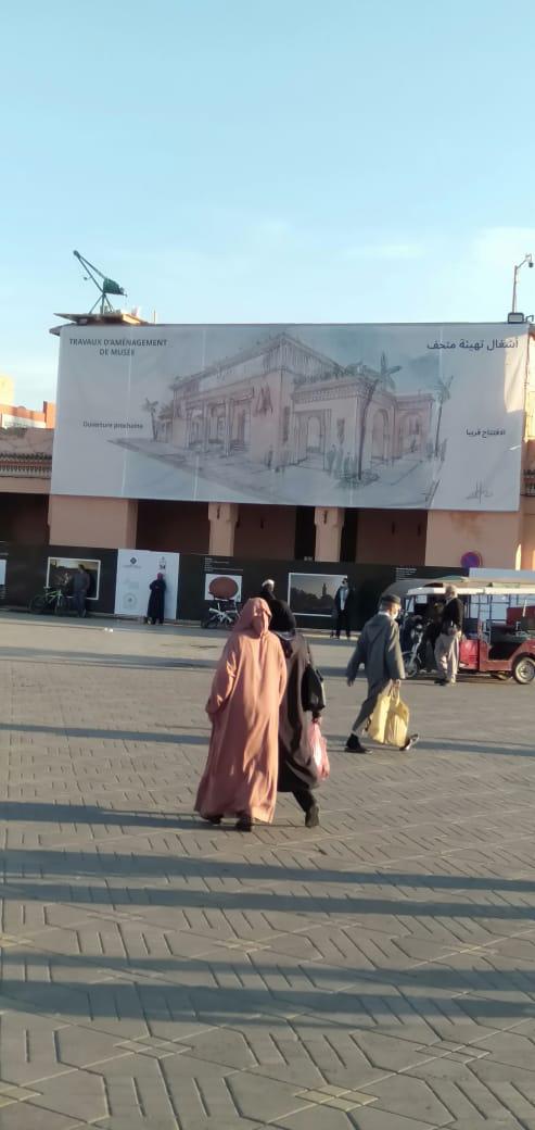 Family with children enjoying the Sahara sand dunes